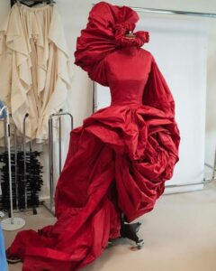 Summer Alexander McQueen on Instagram: “The swirling red Rose dress from the AW19 collection. The silhouette was initially draped on the house model by Sarah Burton and her